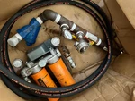 Donaldson P167297 - Hydraulic Duel Filter Heads Inlet/outlet W/bypass & Elements. Fixed Price $1400.00.